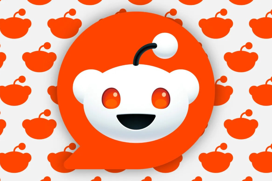 large Reddit logo overlaying background of smaller logo silhouettes