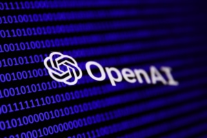 A binary code and OpenAI logo are seen in this multiple exposure illustration photo taken in Krakow, Poland on February 21, 2024. (Photo by Jakub Porzycki/NurPhoto via Getty Images)