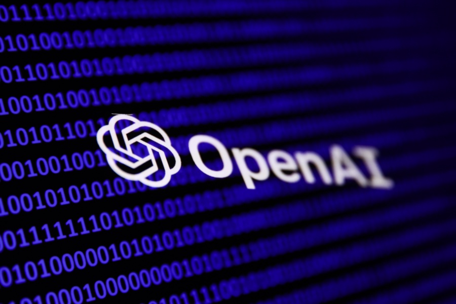 A binary code and OpenAI logo are seen in this multiple exposure illustration photo taken in Krakow, Poland on February 21, 2024. (Photo by Jakub Porzycki/NurPhoto via Getty Images)
