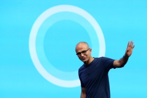 SAN FRANCISCO, CA - APRIL 02: Microsoft CEO Satya Nadella walks in front of the new Cortana logo as he delivers a keynote address during the 2014 Microsoft Build developer conference on April 2, 2014 in San Francisco, California. Satya Nadella delivered the opening keynote to kick off the 2014 Microsoft Build developer conference which runs through April 4. (Photo by Justin Sullivan/Getty Images)