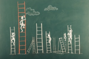 Image of stick figures climbing ladders to represent career moves.