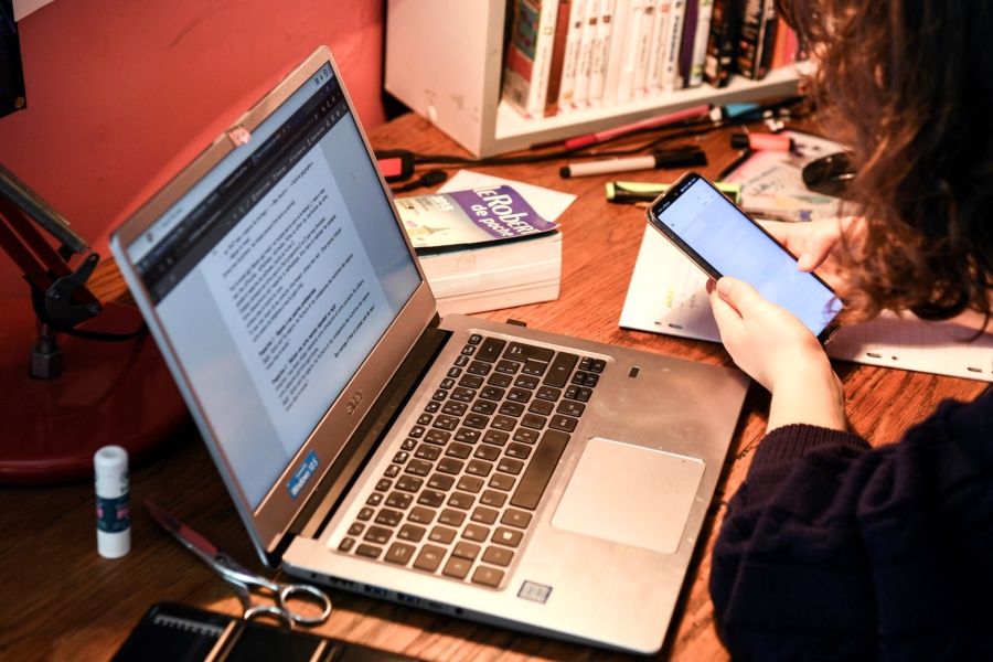 A laptop is pictured as a high school student takes a test online at her home in Chisseaux near Tours on March 27, 2020, on the eleventh day of a lockdown in France to stop the spread of the novel coronavirus COVID-19. (Photo by Alain JOCARD / AFP) (Photo by ALAIN JOCARD/AFP via Getty Images)