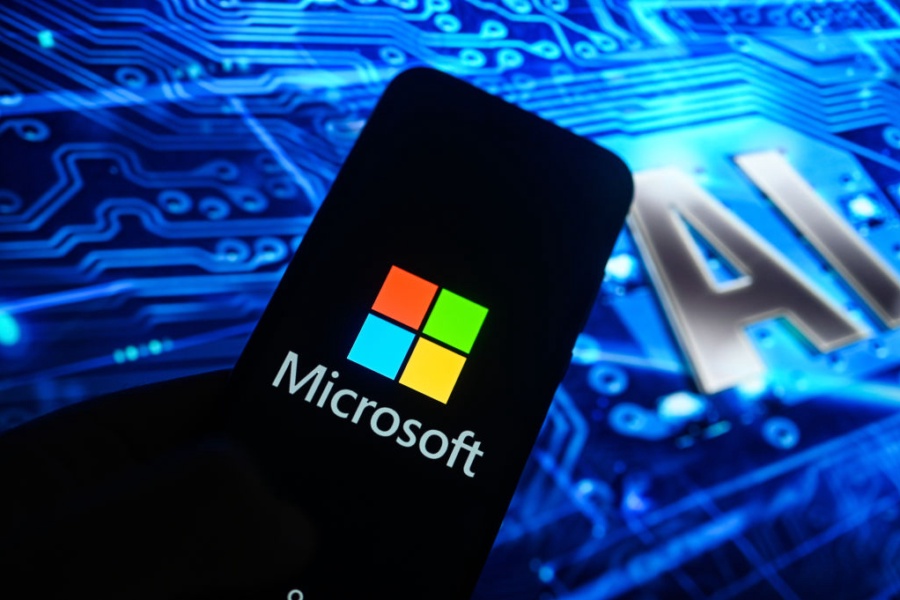 POLAND - 2025/02/24: In this photo illustration, a Microsoft logo is displayed on a smartphone with Artificial Intelligence (AI) symbols on the background. (Photo Illustration by Omar Marques/SOPA Images/LightRocket via Getty Images)