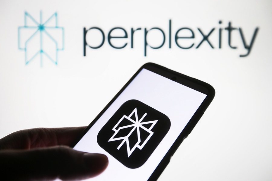 UKRAINE - 2024/01/10: In this photo illustration, Perplexity AI logo is seen on a smartphone and on a pc screen. (Photo Illustration by Pavlo Gonchar/SOPA Images/LightRocket via Getty Images)