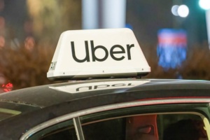 Uber logo on top of car