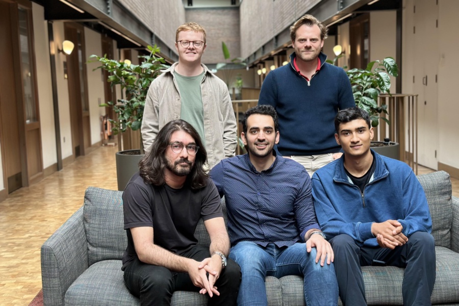 Hasan Sukkar (C) with his team at 11xAI.