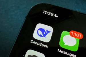This photo illustration shows the DeepSeek app on a mobile phone in Beijing on January 27, 2025. Chinese firm DeepSeek's artificial intelligence chatbot has soared to the top of the Apple Store's download charts, stunning industry insiders and analysts with its ability to match its US competitors. (Photo by GREG BAKER / AFP) (Photo by GREG BAKER/AFP via Getty Images)