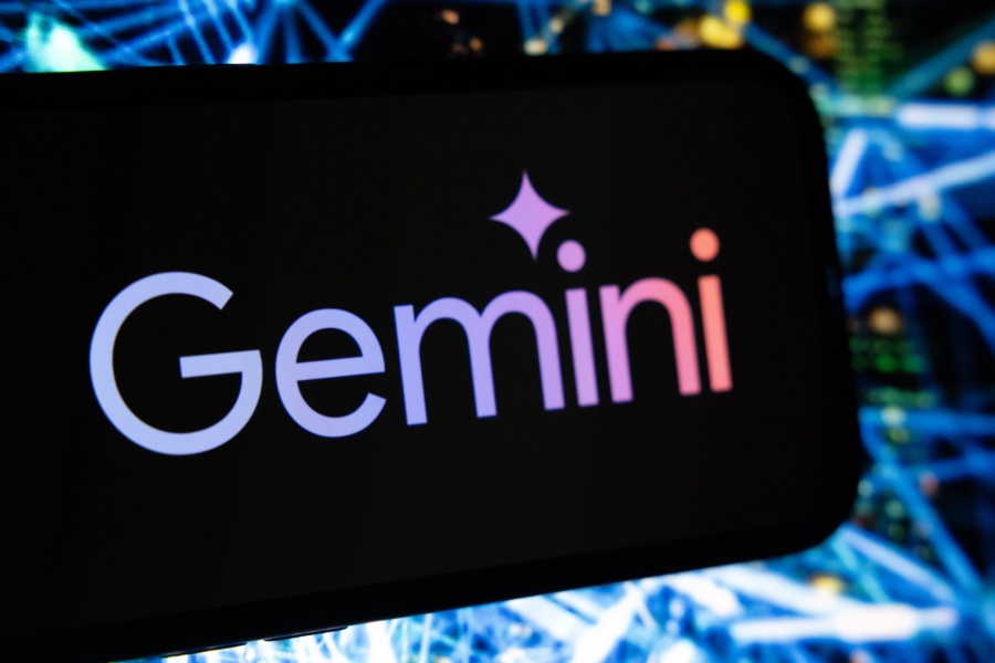 The Google Gemini generative AI logo on a smartphone arranged in Riga, Latvia, on Friday, Aug. 16, 2024. The public release of advanced generative AI tools such as Google's Gemini, Meta AI, and OpenAI's ChatGPT over the past two years has heightened fears that millions of workers could be displaced. Photographer: Andrey Rudakov/Bloomberg via Getty Images