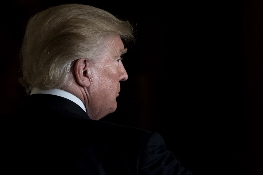 TOPSHOT - US President Donald Trump leaves after a Hispanic Heritage Month event in the East Room of the White House October 6, 2017 in Washington, DC. - President Trump invited over 200 Hispanic business, community, and faith leaders, and guests from across the country to join in the celebration of Hispanic Heritage Month. (Photo by Brendan Smialowski / AFP) (Photo by BRENDAN SMIALOWSKI/AFP via Getty Images)